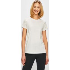 Under Armour - Top. T-shirty damskie Under Armour. W wyprzedaży za 59.90 zł.
