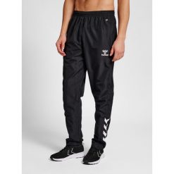Spodnie do biegania Hummel hmlCore. Czarne spodnie sportowe damskie Hummel, xl, bez wzorów, z materiału, do biegania. Za 157.35 zł.