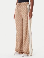 Guess Spodnie dresowe V5YB10 K0282 Brązowy Relaxed Fit. Brązowe spodnie dresowe damskie Guess, s, z aplikacjami, z dresówki. Za 299.99 zł.