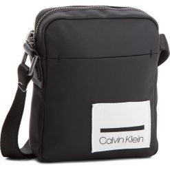 Saszetka CALVIN KLEIN - Task Force (N) Ipad K50K503863 001. Saszetki męskie marki Calvin Klein. W wyprzedaży za 279.00 zł.
