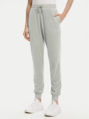 Guess Spodnie dresowe V3BB27 K0232 Zielony Regular Fit. Zielone spodnie dresowe damskie Guess, m, z aplikacjami, z dresówki. Za 249.99 zł.