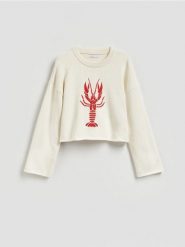 Sweter z haftem - kremowy. Białe swetry damskie Reserved, l, bez wzorów, z bawełny, bez kołnierzyka, bez ramiączek, bez kaptura. Za 139.99 zł.