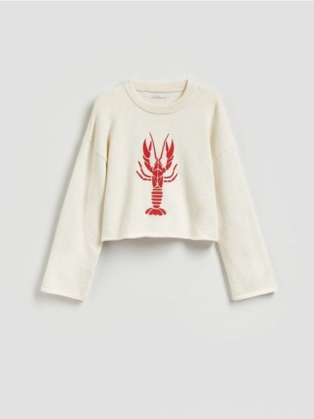 Sweter z haftem - kremowy. Białe swetry damskie Reserved, l, bez wzorów, z bawełny, bez kołnierzyka, bez ramiączek, bez kaptura. Za 139.99 zł.