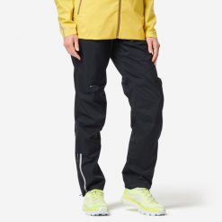 Spodnie do biegania w terenie przeciwdeszczowe damskie Kiprun Run 900 Rain. Czarne spodnie materiałowe damskie KIPRUN, m, bez wzorów, z elastanu. Za 179.99 zł.