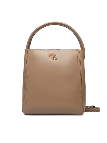 Calvin Klein Torebka Ck Bucket With Strap LV04F3174G Beżowy. Brązowe torebki do ręki damskie Calvin Klein, bez wzorów, ze skóry, bez dodatków. Za 569.99 zł.
