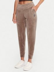 DKNY Sport Spodnie dresowe DP5P3710 Beżowy Regular Fit. Brązowe spodnie dresowe damskie DKNY Sport, xl, bez wzorów, z dresówki. Za 309.99 zł.