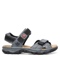 Sandały Rieker. Niebieskie klapki damskie Rieker, bez wzorów, bez obcasa, na płaskiej podeszwie, bez zapięcia. Za 259.99 zł.