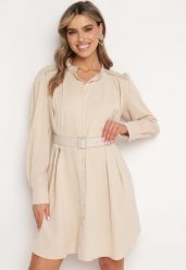 Beżowa Koszulowa Sukienka Zapinana na Guziki z Materiałowym Paskiem Ozdobiona Cyrkoniami Esantia. Brązowe sukienki damskie Born2be, na co dzień, l, bez wzorów, z materiału, bez kołnierzyka, bez ramiączek, midi, koszulowe. Za 129.99 zł.