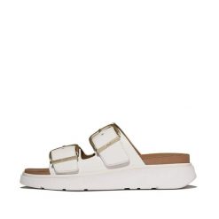Damskie sandały na koturnie FitFlop Gen-FF. Czarne sandały damskie FIT FLOP, bez wzorów, z materiału, bez obcasa, na koturnie, bez zapięcia. Za 678.50 zł.