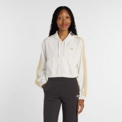 Bluza damska New Balance WJ61B759SST – beżowa. Brązowe bluzy damskie New Balance, s, bez wzorów, z dresówki, z kapturem. Za 299.99 zł.