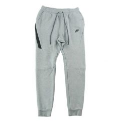 Second life - Spodnie dresowe męskie o wąskim kroju z ściągaczami - Jak nowy. Szare spodnie sportowe męskie Nike, m, bez wzorów, z dresówki, do biegania. Za 170.36 zł.