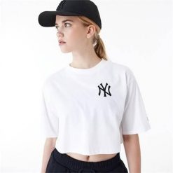 Koszulka sportowa damska New Era Neyyan. Białe koszulki sportowe damskie New Era, uniwersalny, bez wzorów, bez kołnierzyka, bez ramiączek. Za 268.00 zł.