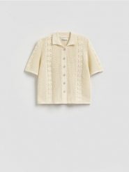 Ażurowy sweter polo - kremowy. Białe swetry damskie Reserved, l, w ażurowe wzory, z bawełny, bez kołnierzyka, bez ramiączek, bez kaptura. Za 129.99 zł.