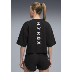 Damska skrócona koszulka PUMA x HYROX Lifestyle PUMA Black. Czarne koszulki sportowe damskie Puma, s, bez wzorów, sportowe, bez kołnierzyka. Za 179.00 zł.