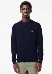 Klasyczny sweter Lacoste granatowy z okrągłym dekoltem. Niebieskie swetry przez głowę męskie Lacoste, l, bez wzorów, z bawełny, bez kołnierzyka. Za 634.45 zł.