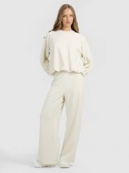 4F Spodnie dresowe z szerokimi nogawkami z modalem damskie - beżowe XL. Brązowe spodnie dresowe damskie 4f, xl, bez wzorów, z dresówki. Za 189.99 zł.
