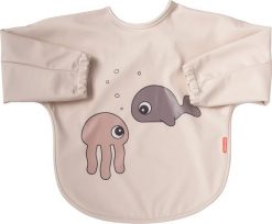 Śliniak z rękawami Sea 6-18 m różowy. Czerwone śliniaki dla dzieci Done by deer, bez wzorów. Za 89.00 zł.