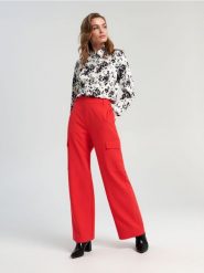 Spodnie cargo - pomarańczowy. Brązowe spodnie materiałowe damskie Sinsay, l, bez wzorów, z włókna. Za 79.99 zł.