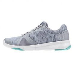 Buty do chodzenia damskie Reebok Flexile. Białe obuwie sportowe damskie Reebok, bez wzorów, z materiału, do biegania. Za 296.00 zł.