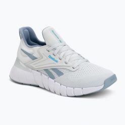 Buty treningowe damskie Reebok Nano Gym. Szare obuwie sportowe damskie Reebok, bez wzorów, z materiału, na fitness i siłownię. Za 399.99 zł.