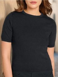 Koszulka - czarny. Czarne t-shirty damskie Sinsay, l, bez wzorów, z materiału, bez kołnierzyka. Za 19.99 zł.
