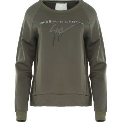 Ciemnozielona Bluza Before The Night is Over. Zielone bluzy sportowe damskie Born2be. Za 49.99 zł.