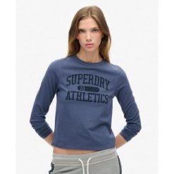 Wąska koszulka z długim rękawem Athletic Ringer. Niebieskie koszulki sportowe damskie Superdry., bez wzorów, bez kołnierzyka, bez ramiączek. Za 168.10 zł.