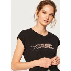 T-shirt z błyszczącym nadrukiem - Czarny. Czarne t-shirty damskie Reserved, z nadrukiem. Za 24.99 zł.