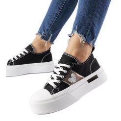 Czarno-srebrne trampki na platformie Lawton czarne. Czarne trampki i tenisówki damskie bez wzorów, z tworzywa sztucznego, eleganckie, bez zapięcia. Za 145.37 zł.