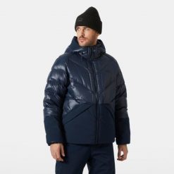 Kurtka puchowa Helly Hansen Village Down. Niebieskie kurtki męskie Helly Hansen, m, bez wzorów, z puchu, bez kaptura. W wyprzedaży za 1,398.50 zł.