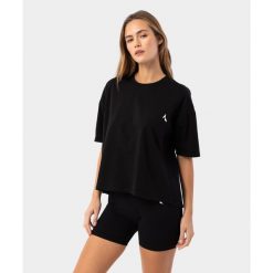 Koszulka dla kobiet z rozcięciem na plecach Carpatree Stitch. Czarne koszulki sportowe damskie Carpatree, m, bez wzorów, sportowe, bez kołnierzyka. W wyprzedaży za 101.99 zł.