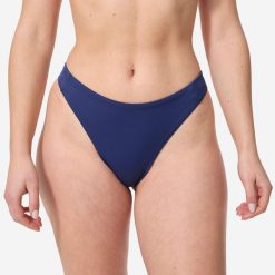 Dół kostiumu kąpielowego surfingowego damski Olaian Nais. Niebieskie bikini damskie OLAIAN, na lato, bez wzorów. W wyprzedaży za 19.99 zł.