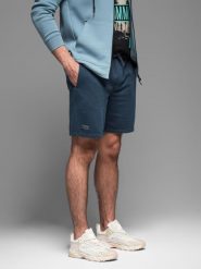Krótkie spodenki dresowe męskie RELAXED FIT w stylu athleisure granatowe V4 OM-SRWS-0122 M. Krótkie spodenki sportowe męskie Ombre, m, bez wzorów, z dresówki. Za 121.01 zł.