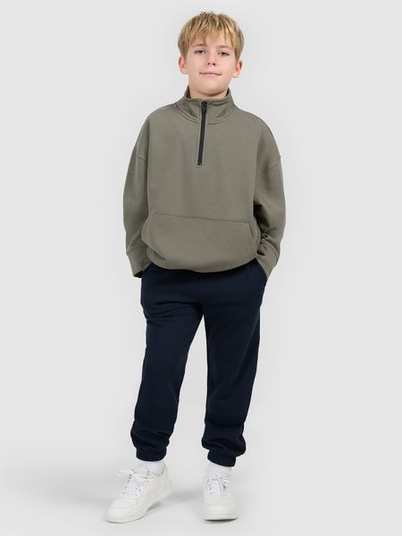 4F Spodnie dresowe joggery chłopięce - granatowe 164 (13-14 lat). Niebieskie spodnie sportowe dla chłopców 4f, bez wzorów, z bawełny, młodzieżowe. Za 69.99 zł.