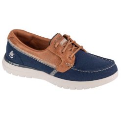 Buty do chodzenia damskie Skechers On The Go Flex Embark. Niebieskie obuwie sportowe damskie Skechers, bez wzorów, z materiału, trekkingowe. Za 319.99 zł.