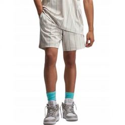 Spodnie treningowe męskie Nike DM1357104. Białe spodnie sportowe męskie Nike, na lato, m, bez wzorów, z materiału, na fitness i siłownię. Za 266.00 zł.