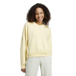 Bluza damska ADIDAS Gym & Pilates. Zielone bluzy damskie Adidas, l, bez wzorów, z bawełny, bez kaptura. W wyprzedaży za 129.99 zł.