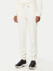 Armani Exchange Spodnie dresowe 8NYPLG YJE5Z 1130 Beżowy Regular Fit. Brązowe spodnie dresowe damskie Armani Exchange, m, bez wzorów, z bawełny. Za 269.99 zł.