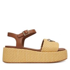 Sandały LOVE MOSCHINO. Brązowe sandały damskie Love Moschino, bez wzorów, bez obcasa, na koturnie, bez zapięcia. Za 939.99 zł.