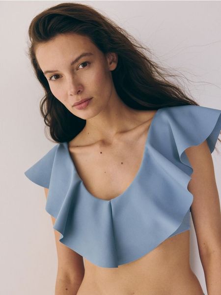 Góra od bikini - niebieski. Niebieskie bikini damskie Reserved, bez wzorów. W wyprzedaży za 32.99 zł.