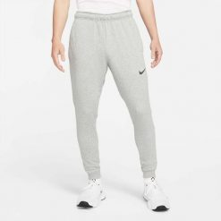 Spodnie sportowe męskie Nike Drifit Trapered. Czarne buty sportowe męskie Nike, z dresówki, bez zapięcia, na fitness i siłownię. Za 346.00 zł.