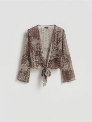 Plażowa bluzka z wiązaniem - ciemnobrązowy. Brązowe bluzki damskie Reserved, l, bez wzorów, z tkaniny, bez kołnierzyka, bez ramiączek. Za 89.99 zł.