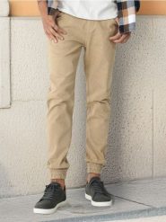 Jeansy jogger - żółty. Żółte jeansy męskie Sinsay. W wyprzedaży za 45.99 zł.