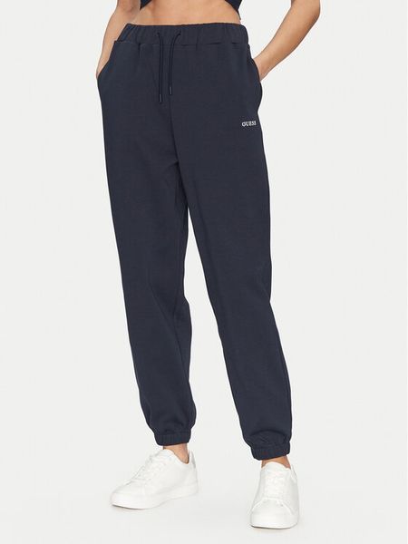 Guess Spodnie dresowe V5GB03 KCS01 Granatowy Regular Fit. Niebieskie spodnie dresowe damskie Guess, l, z aplikacjami, z bawełny. Za 189.99 zł.
