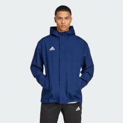 Kurtka piłkarska męska Adidas Entrada 22 All-Weather. Niebieskie kurtki męskie Adidas, m, bez wzorów, z materiału, klasyczne, z kapturem. Za 176.68 zł.