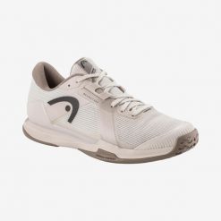Buty do tenisa Head Sprint Pro 4.0. Czerwone buty sportowe męskie Head, bez zapięcia, do biegania. W wyprzedaży za 612.00 zł.