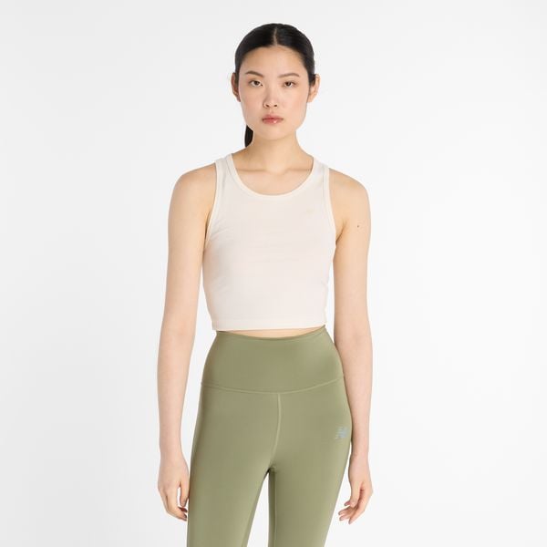 Koszulka damska New Balance WT43523PEF – beżowa. Brązowe koszulki sportowe damskie New Balance, l, bez wzorów, z lyocellu, sportowe, bez kołnierzyka. Za 169.99 zł.