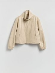 Kurtka z wysoką stójką - beżowy. Brązowe kurtki damskie Reserved, l, bez wzorów, ze skóry, bez kaptura. Za 199.99 zł.