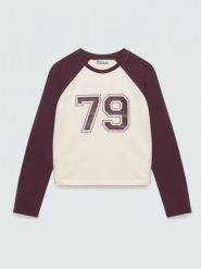 Bluzka dziewczęca longsleeve z kontrastowymi rękawami perłowa filiana 103. Białe t-shirty i topy dla dziewczynek Big Star, bez wzorów, z bawełny, bez ramiączek. Za 79.99 zł.