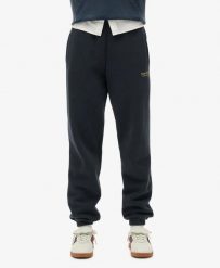 Superdry Damskie spodnie dresowe Essential Logo ze ściągaczami Richest Navy. Niebieskie spodnie dresowe damskie Superdry., bez wzorów, z bawełny. Za 307.80 zł.